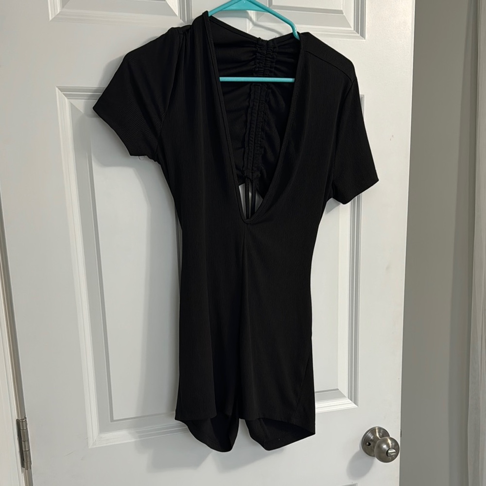 Backless Black Woman’s Romper